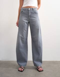 Model wearing Barrel high rise jean circular design in pretty grey