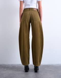 Model wearing Barrel high rise jean in honey cord