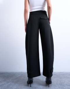 Model wearing Barrel leg trouser in black