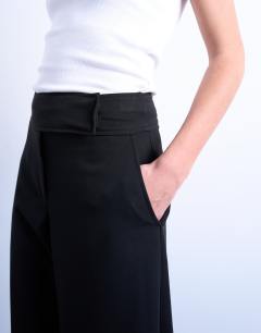 Model wearing Barrel leg trouser in black