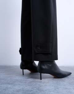 Model wearing Barrel leg trouser in black