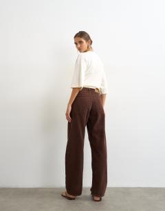 Model wearing Barrel mid rise jean in chocolate cord