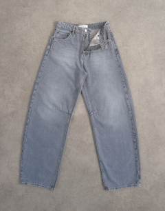 Model wearing Barrel mid rise jean in pretty grey