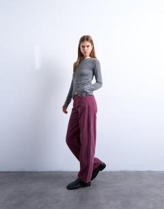 Model wearing Barrel mid rise jean in purple cord