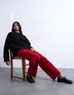 Model wearing Barrel mid rise jean in red cord