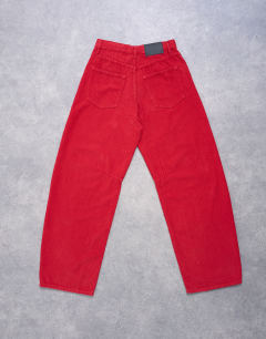 Model wearing Barrel mid rise jean in red cord