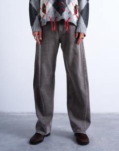 Model wearing Barrel mid rise jean with seam detail in otter