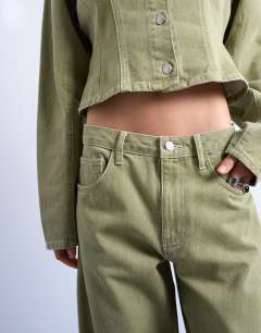 Model wearing Barrel mid rise jean with seam details in avocado