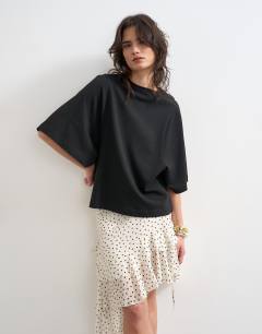 Model wearing Batwing t-shirt in black