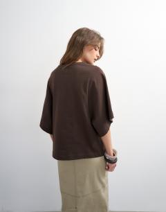 Model wearing Batwing t-shirt in dark chocolate