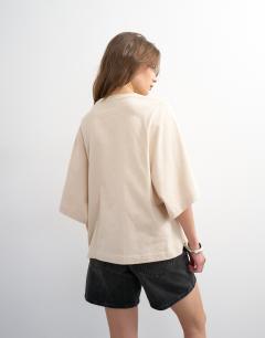 Model wearing Batwing t-shirt in stone