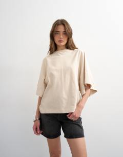 Model wearing Batwing t-shirt in stone