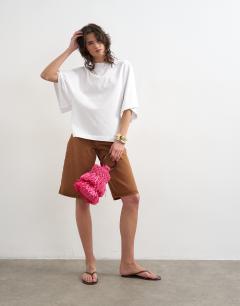 Model wearing Batwing t-shirt in white