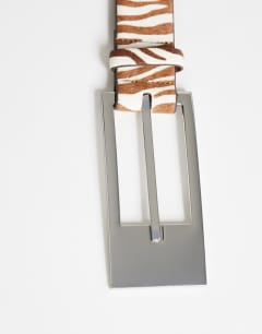 Model wearing Bea hair on real leather wide belt in brown zebra