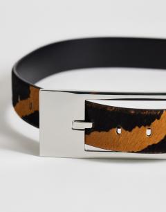 Model wearing Bea hair on real leather wide belt in camel zebra