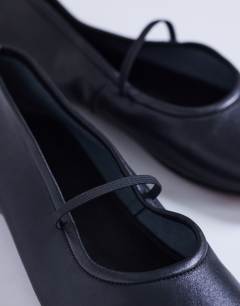 Model wearing Bella leather round toe ballet flat in black