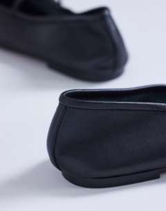 Model wearing Bella leather round toe ballet flat in black