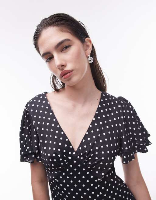 Topshop Bella mini tea dress with flutter sleeve in black and white spot print