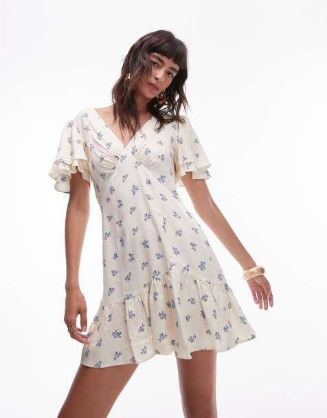 Topshop - Bella - Tea-kjole i minilængde med flagrende ærmer i elfenbensfarve med blomsterprint - view 1