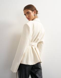 Model wearing Belted blazer in ivory