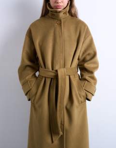 Model wearing Belted longline formal car coat in sage