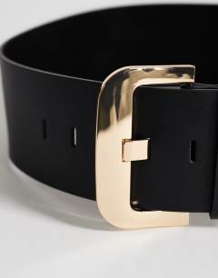 Model wearing Benny wide real leather belt in black