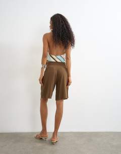 Model wearing Bermuda short in chocolate