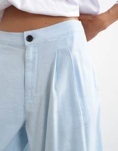 Model wearing Bermuda short in sky blue