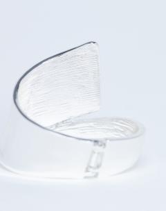 Model wearing Bethany plated bangle in silver
