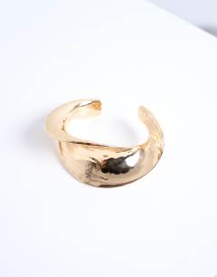Model wearing Bianca chunky twisted bracelet in gold