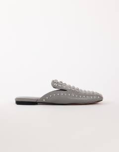 Model wearing Bianca studded flat shoe in grey