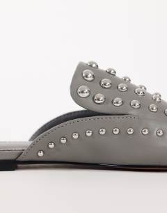 Model wearing Bianca studded flat shoe in grey
