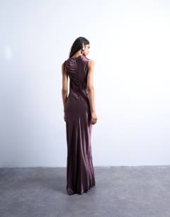 Model wearing Bias ruched arm hole maxi occasion dress in deep burgundy