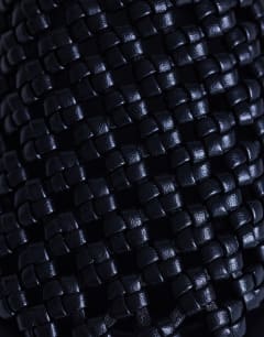 Model wearing Bibi woven mule in black