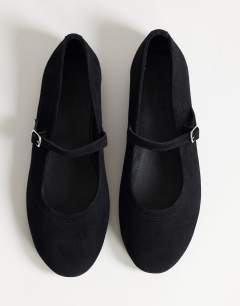 Model wearing Billy real suede ballet flat with buckle in black