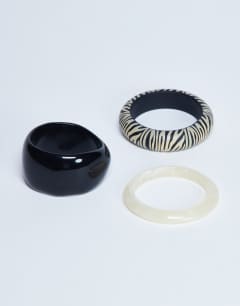 Model wearing Blaire 3 pack bangles in black and white zebra