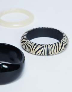 Model wearing Blaire 3 pack bangles in black and white zebra