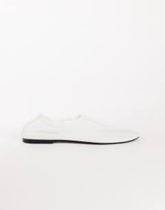 Model wearing Blake mesh ballet flat shoe in off white