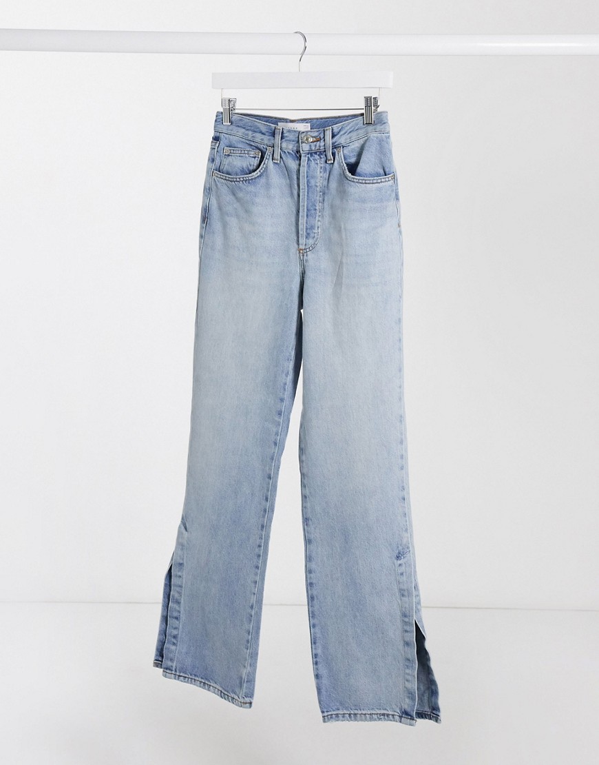 Topshop – Blekta dad jeans med slits i bensluten-Blå