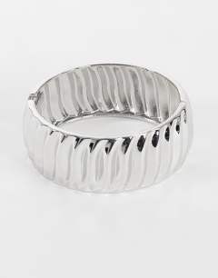 Model wearing Blossom chunky bangle in silver