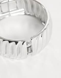 Model wearing Blossom chunky bangle in silver