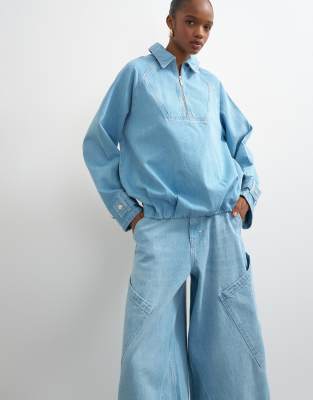 Blouson-Jeansjacke in Mittelblau mit Kragen und kurzem Reißverschluss Blau 36