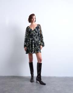 Model wearing Blouson sleeve mini tea dress in grungy floral