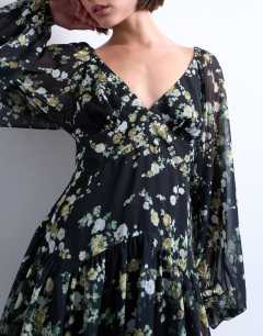 Model wearing Blouson sleeve mini tea dress in grungy floral