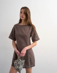 Model wearing Boat neck structured sleeve mini dress choc