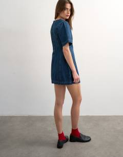 Model wearing Boat neck structured sleeve mini dress in mid blue