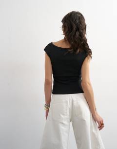 Model wearing Boat neck vest in black