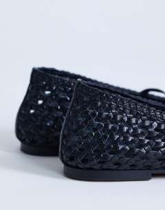 Model wearing Bobbi leather woven ballet in black