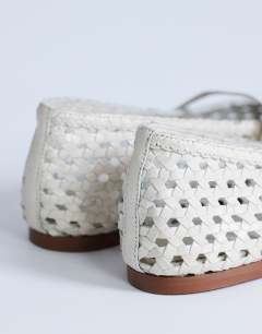 Model wearing Bobbi leather woven ballet in buttermilk