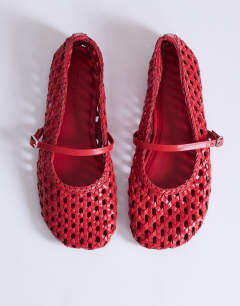 Model wearing Bobbi leather woven ballet in red